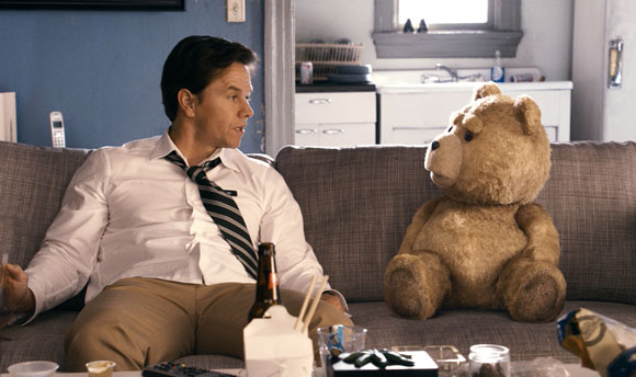 Mark Wahlberg and Ted in a scene from Ted. Mark Wahlberg and Ted in a scene from Ted.