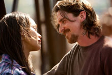 Zoe Saldana and Christian Bale in Out of the Furnace Zoe Saldana and Christian Bale in Out of the Furnace